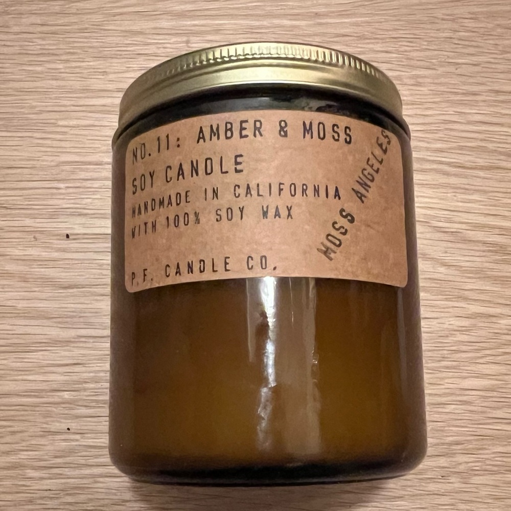 P.F. Candle Amber + Moss candle. New/Unused